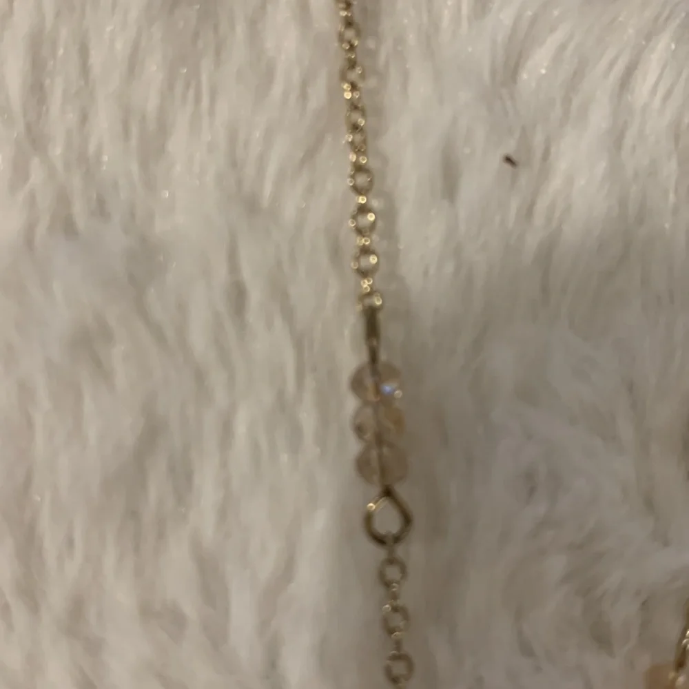 Disc‎ pendant necklace with some little beads on chain.Beautiful and sparkly.